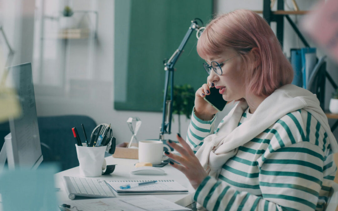 photo of a woman speaking with a collections agent on the phone